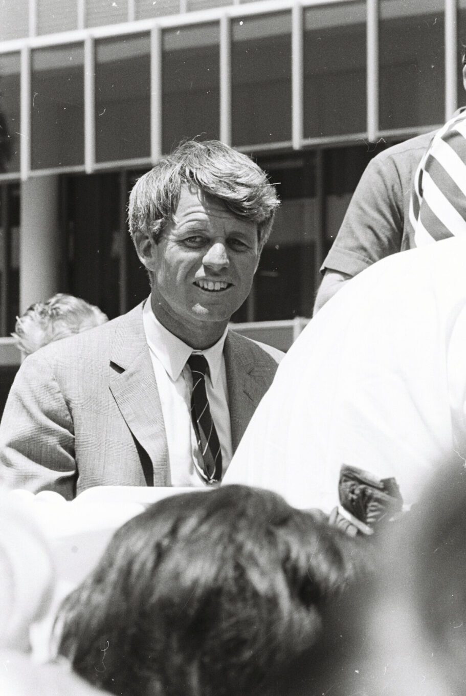 Robert F. Kennedy preparing to give a speech at a presidential campaign stop