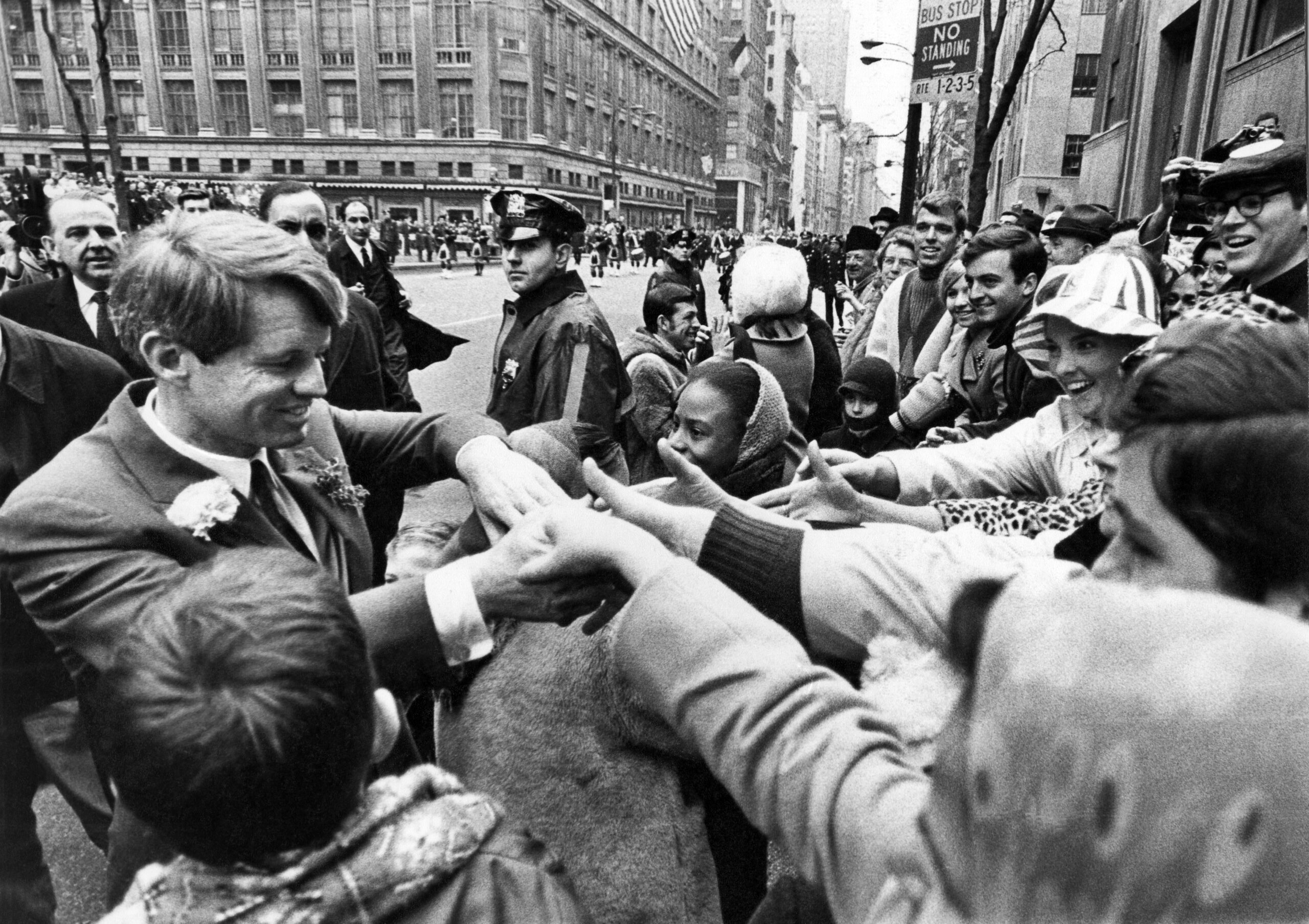 Robert F. Kennedy greets people, 1968.