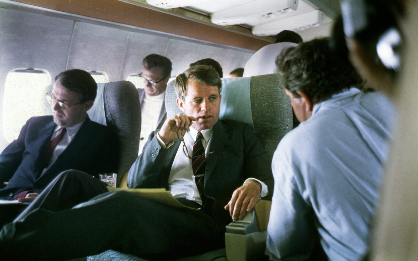 Robert F. Kennedy aboard a plane while campaigning for the Presidency of the United States, 1968