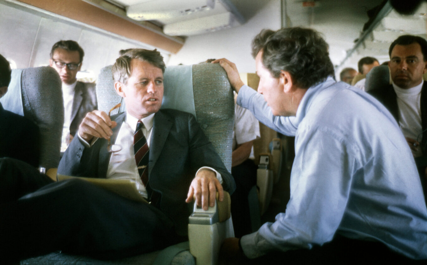 Robert F. Kennedy aboard a plane while campaigning for the Presidency of the United States, 1968