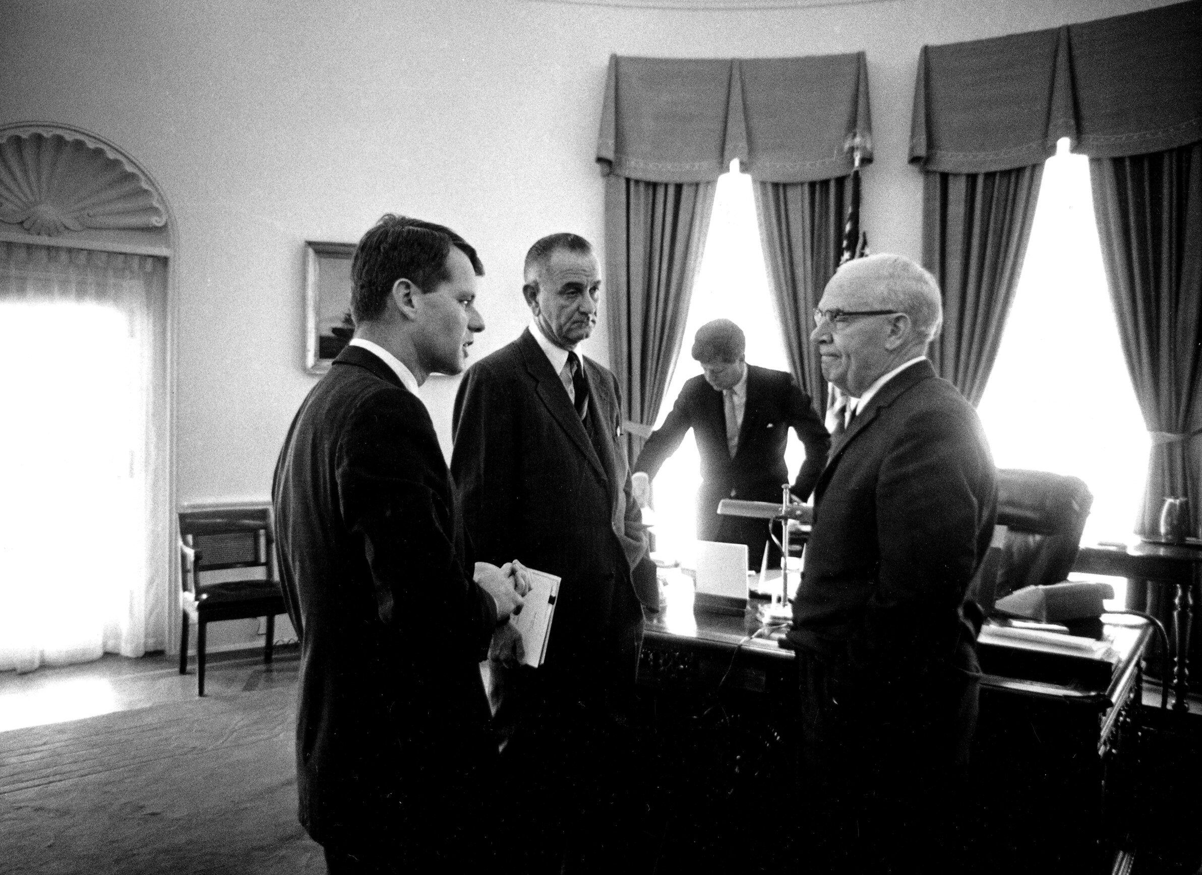 John F. Kennedy, Vice President Lyndon Johnson, and Robert Kennedy, and Secretary of Commerce Luther Hodges