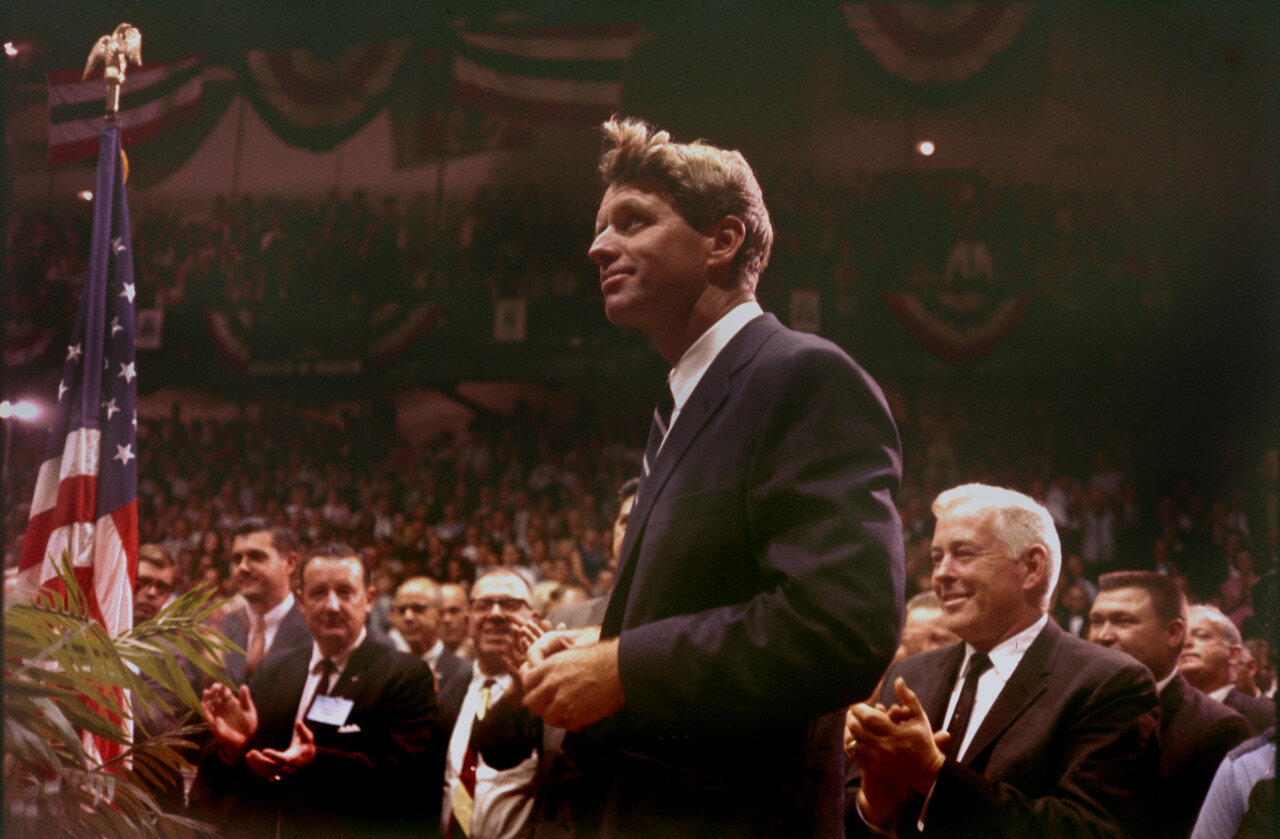 Audience applauds after campaign speech